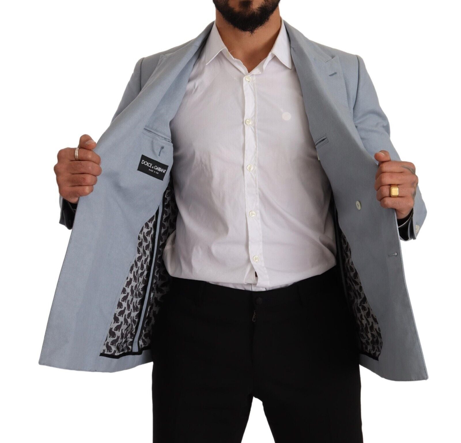 Blazer slim fit en coton et lin bleu de Dolce & Gabbana, veste élégante pour homme, détails de la couture et finition soignée.