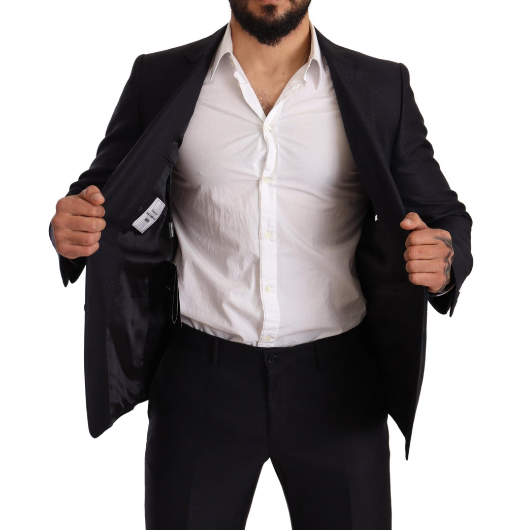 Costume deux pièces slim fit Dolce & Gabbana à motif bleu, veste et pantalon élégants pour homme.