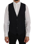 Gilet en laine bleue extensible de Dolce & Gabbana, coupe ajustée, détail élégant, porté sur un mannequin.