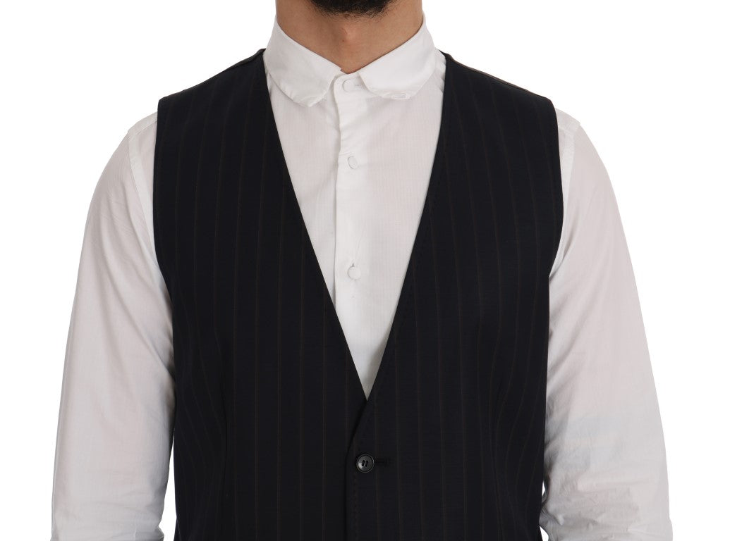 Gilet en laine stretch bleu Dolce & Gabbana avec col en V et finition soignée, porté sur un mannequin.
