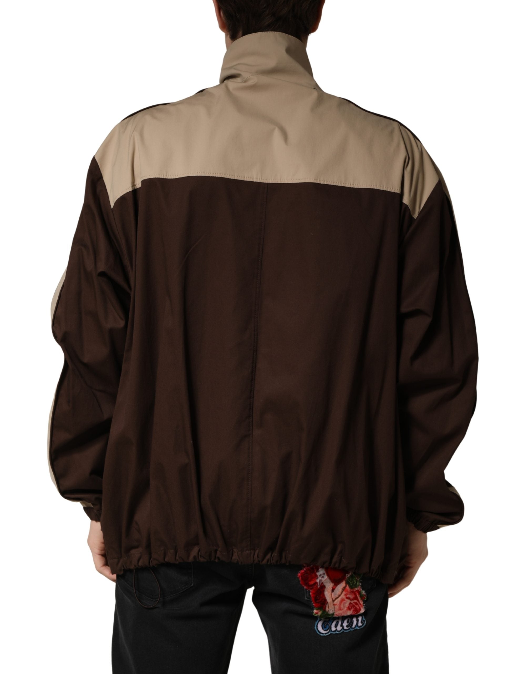 Veste coupe-vent Dolce & Gabbana en coton marron beige avec fermeture éclair, style décontracté et moderne.