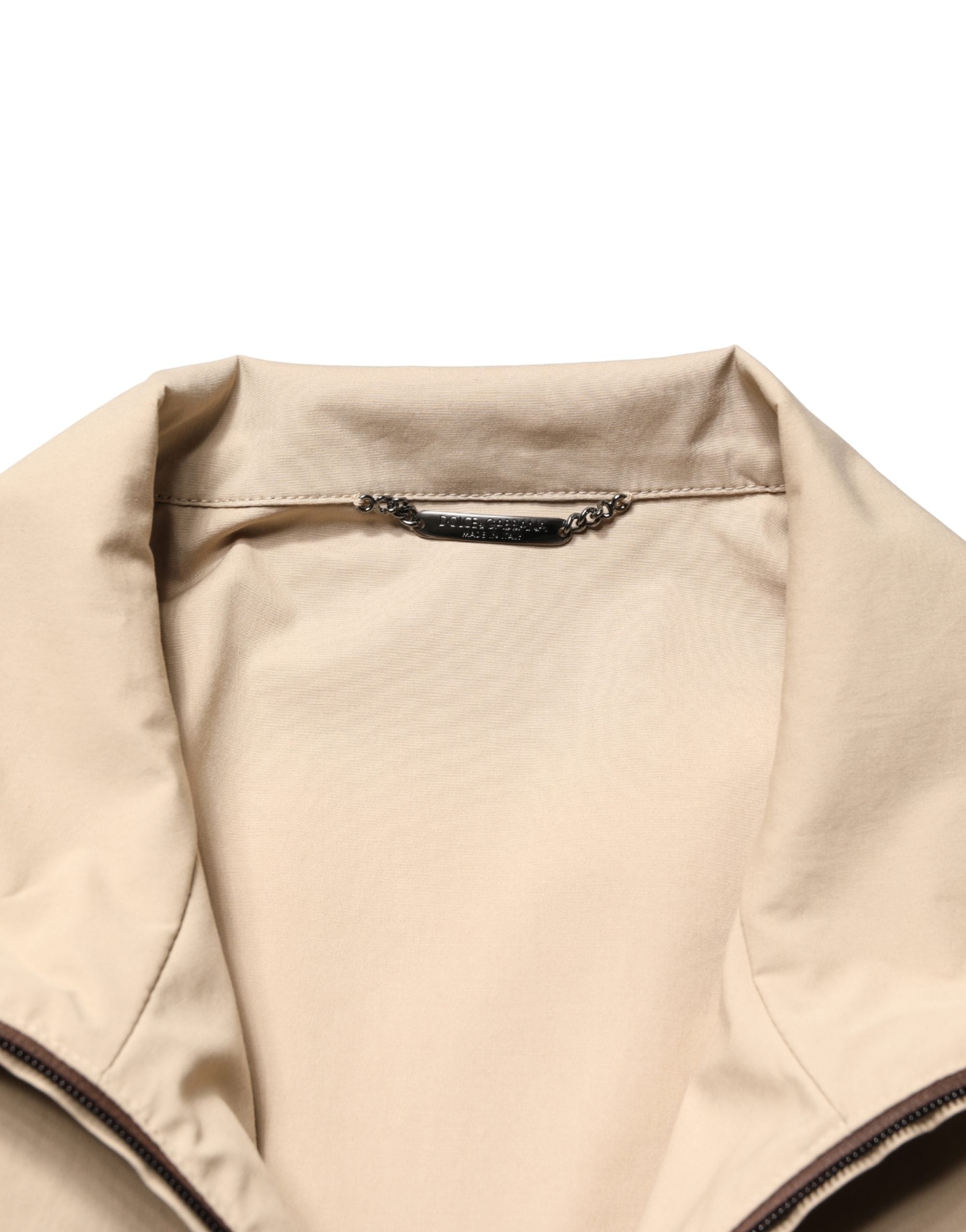 Veste coupe-vent Dolce & Gabbana en coton marron beige avec fermeture éclair, style décontracté et élégant.