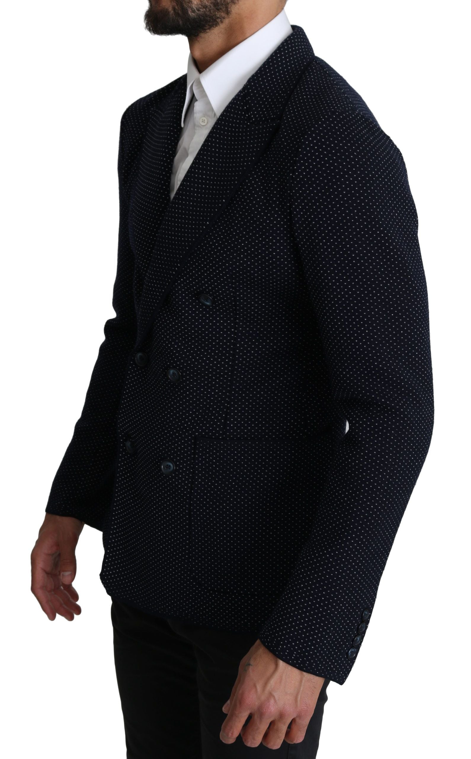 Manteau blazer bleu marine à pois Dolce & Gabbana, double boutonnage, coupe élégante et détails sophistiqués.