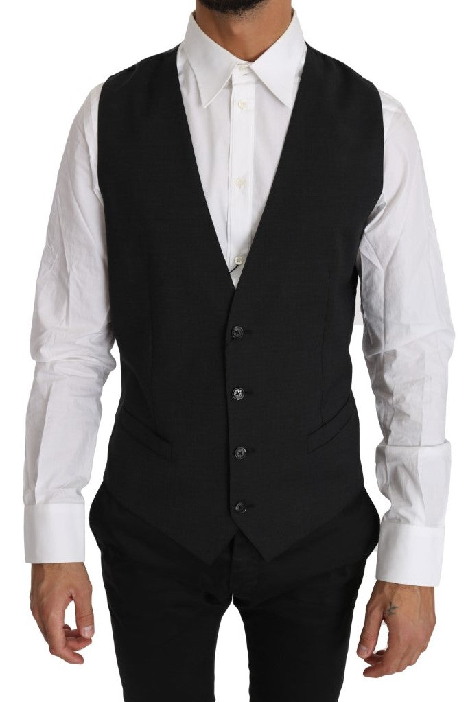 Gilet en laine gris solide de Dolce & Gabbana, veste cintrée élégante pour homme, détail de la texture en laine 100 %.
