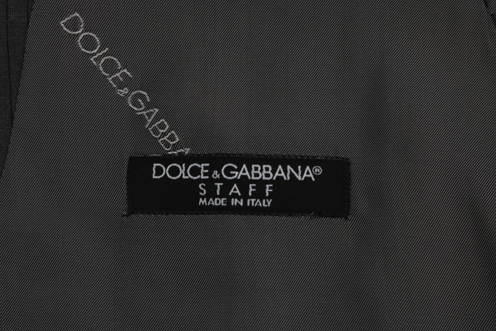 Gilet gris Dolce & Gabbana en coton et rayonne, vue de face, avec détails de couture et texture douce.