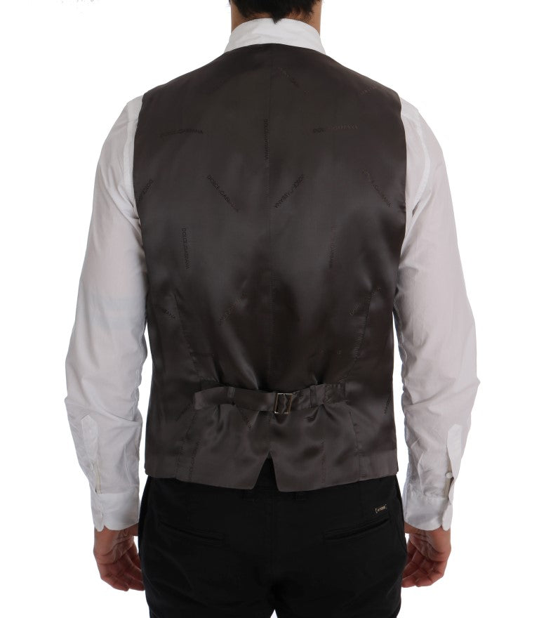 Gilet à rayures gris en coton Dolce & Gabbana STAFF, style élégant, porté sur un modèle, détails visibles.