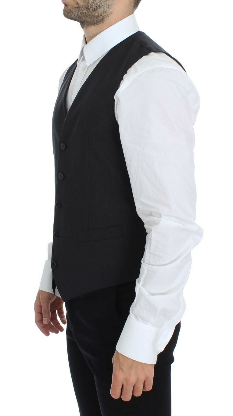 Veste-blazer en laine gris stretch de Dolce & Gabbana, élégante et ajustée, pour un style sophistiqué et moderne.