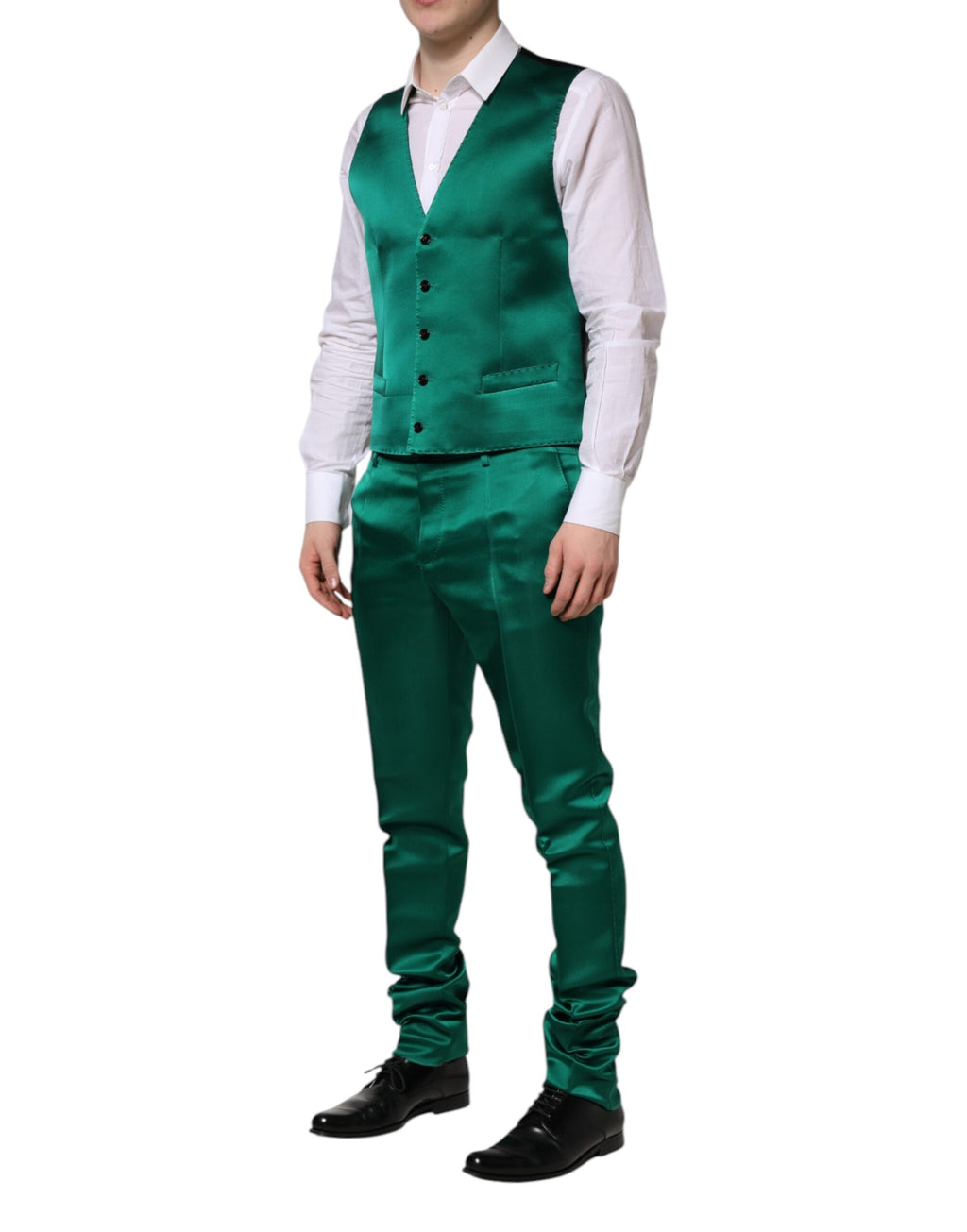 Costume en soie verte Dolce & Gabbana à trois pièces, à coupe simple, avec veste à boutons et pantalon assorti.