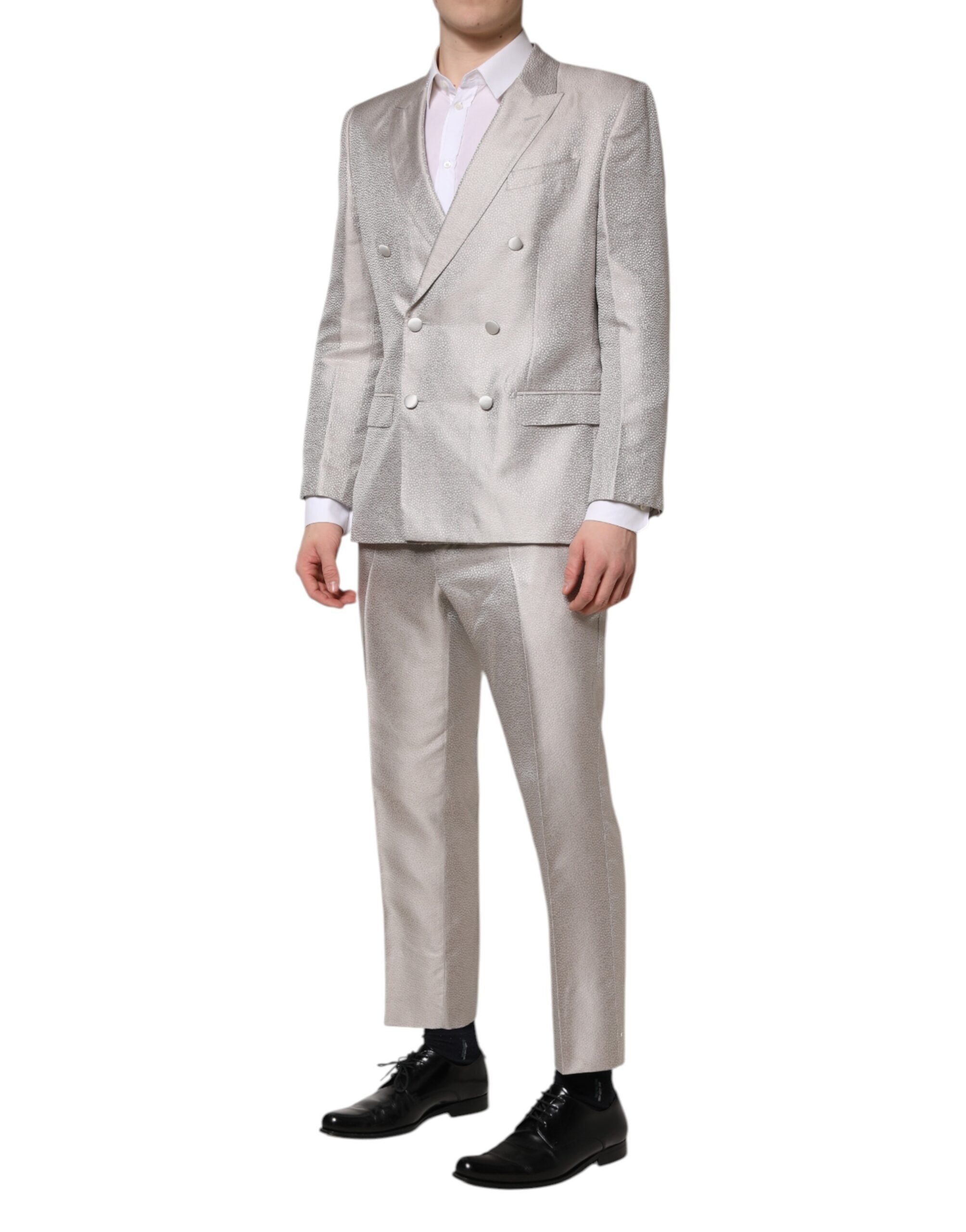 Costume deux pièces en jacquard de soie gris clair à pois de Dolce & Gabbana, veste et pantalon élégants.