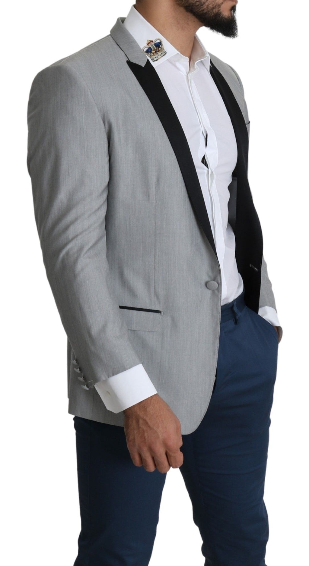 Blazer Dolce & Gabbana gris clair à un bouton, coupe cintrée, avec détails de couture élégants et poches latérales.