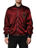 Veste en nylon marron Dolce & Gabbana avec broderie DG Crown, style élégant et moderne, visible de face avec détails de broderie.