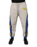 Pantalon de jogging Dolce & Gabbana en coton multicolore, style décontracté, avec logo Dolce & Gabbana visible.