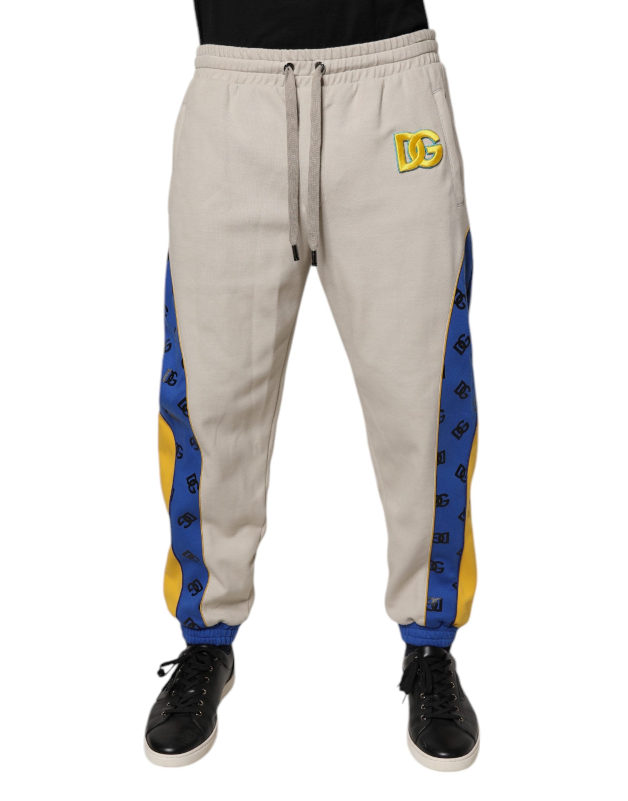 Pantalon jogger Dolce & Gabbana en coton multicolore, sweatpants avec design coloré et logo de la marque, vue de face.