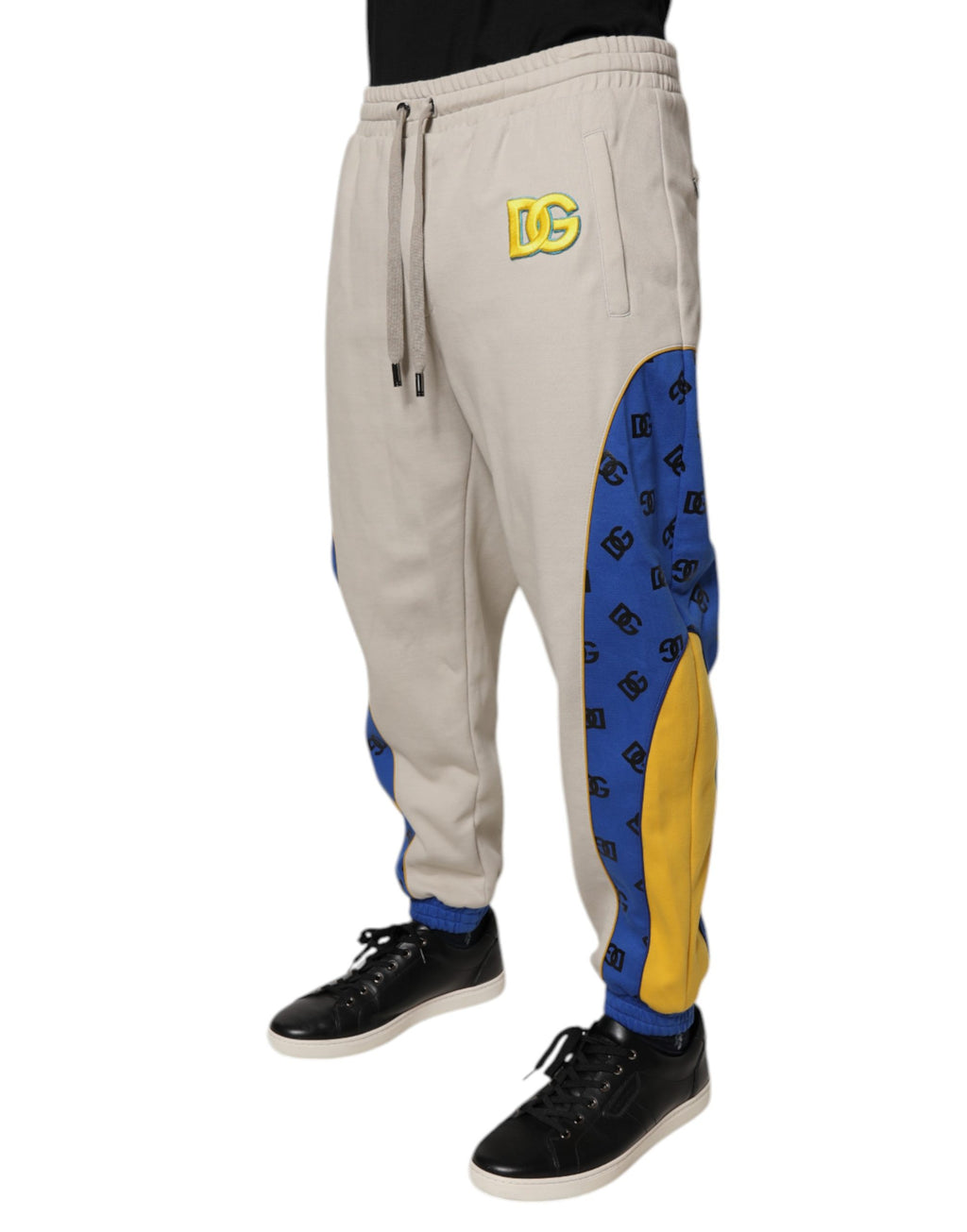 Pantacourt jogger en coton multicolore Dolce & Gabbana, style décontracté avec logo et design coloré, pour un look tendance et confortable.
