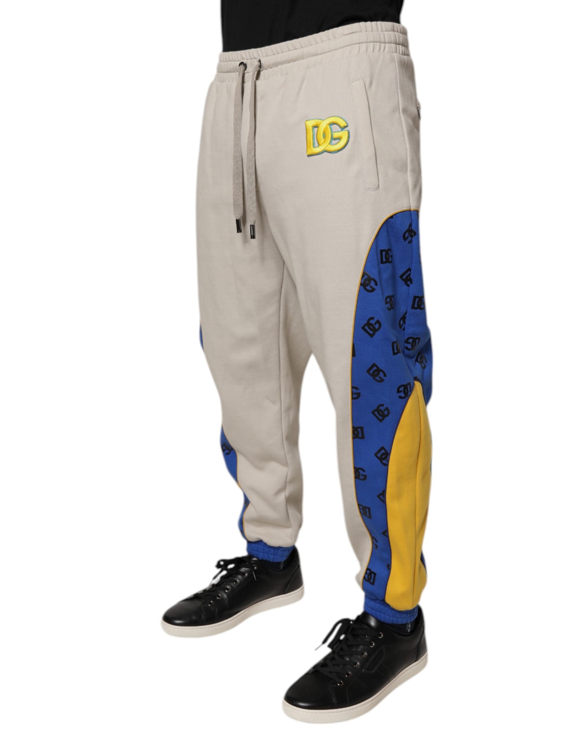 Pantacourt jogger en coton multicolore Dolce & Gabbana, style décontracté avec logo et design coloré, pour un look tendance et confortable.