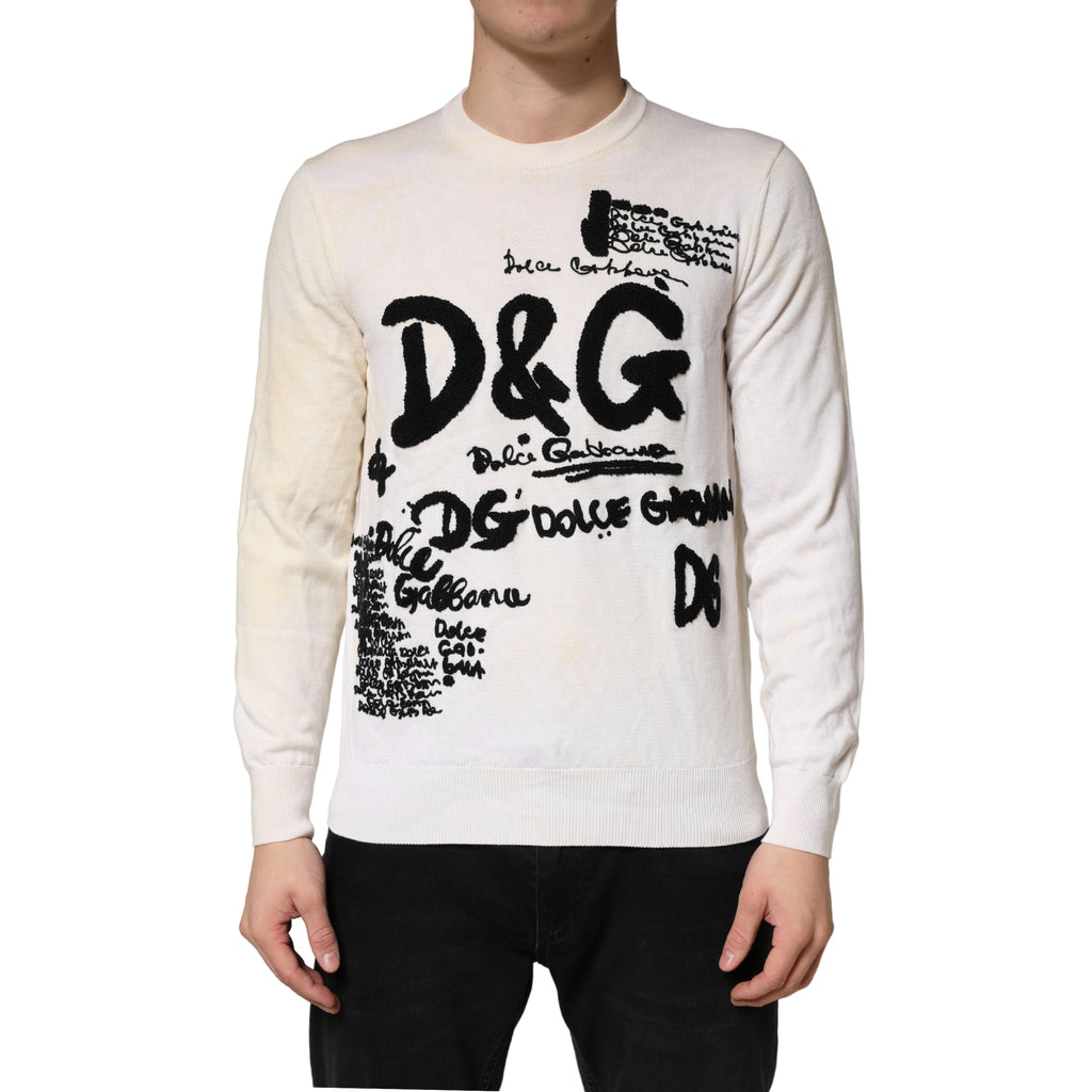 Pull blanc en laine vierge Dolce & Gabbana à logo graphique, col ras du cou, porté sur un mannequin.