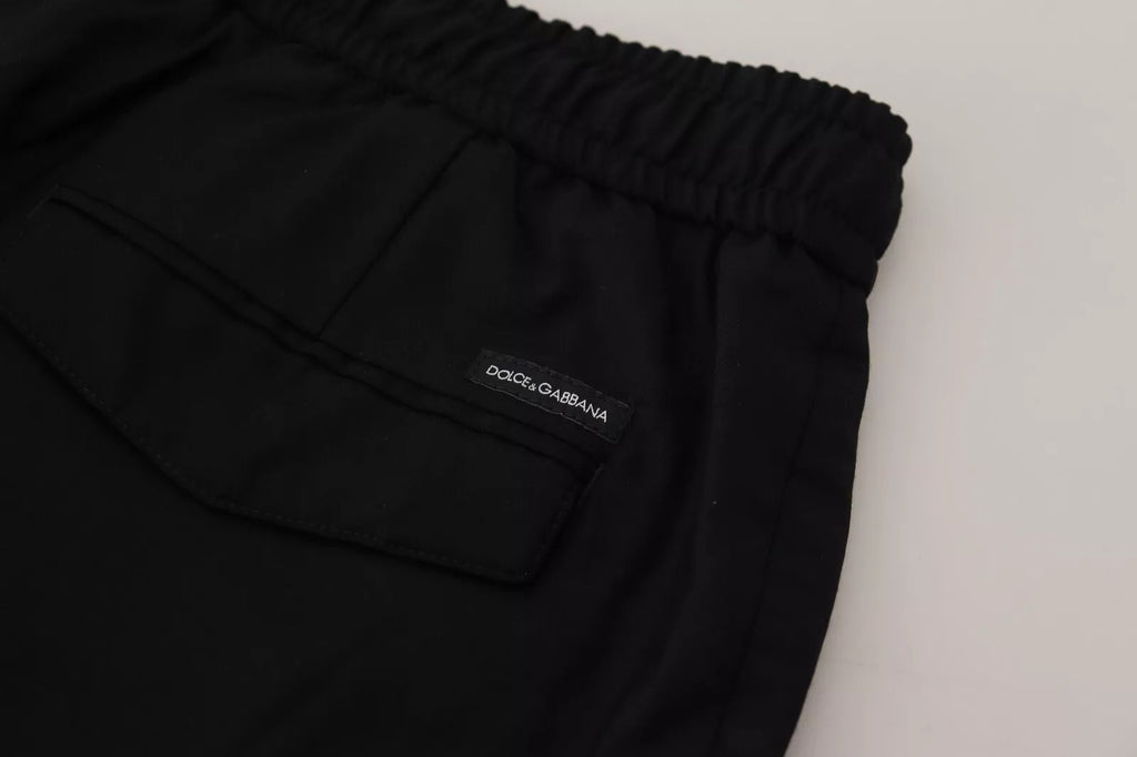 Pantalon de jogging noir en laine Dolce & Gabbana, style décontracté avec ceinture élastique et poches latérales.