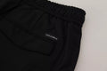 Pantalon de jogging noir en laine Dolce & Gabbana, style décontracté avec ceinture élastique et poches latérales.