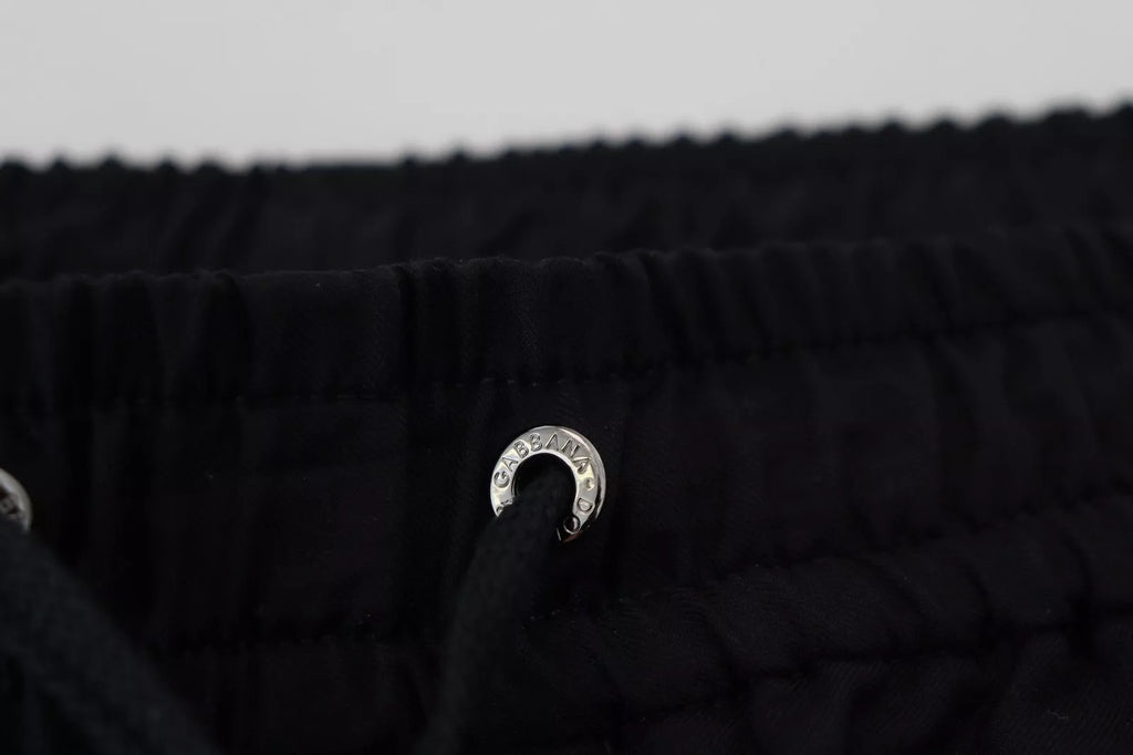 Pantalon de jogging noir en laine Dolce & Gabbana, style décontracté avec coupe ajustée et détails modernes.