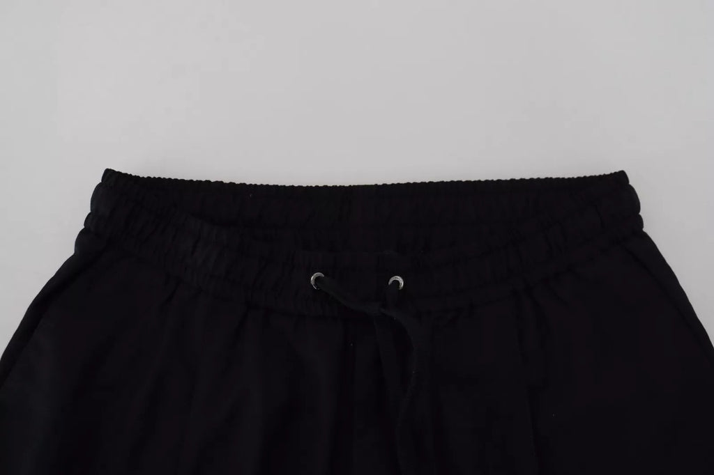 Pantalon jogging noir en laine Dolce & Gabbana, coupe décontractée avec ceinture élastique et poches latérales.