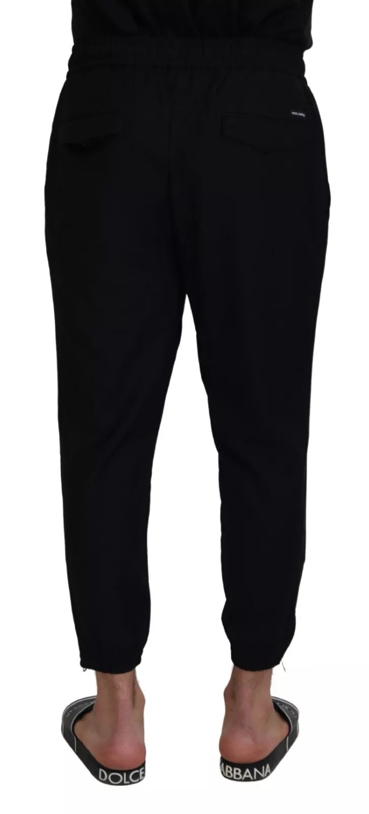 Pantalon de jogging noir en laine de Dolce & Gabbana, style décontracté et confortable, vue de face sur un modèle.