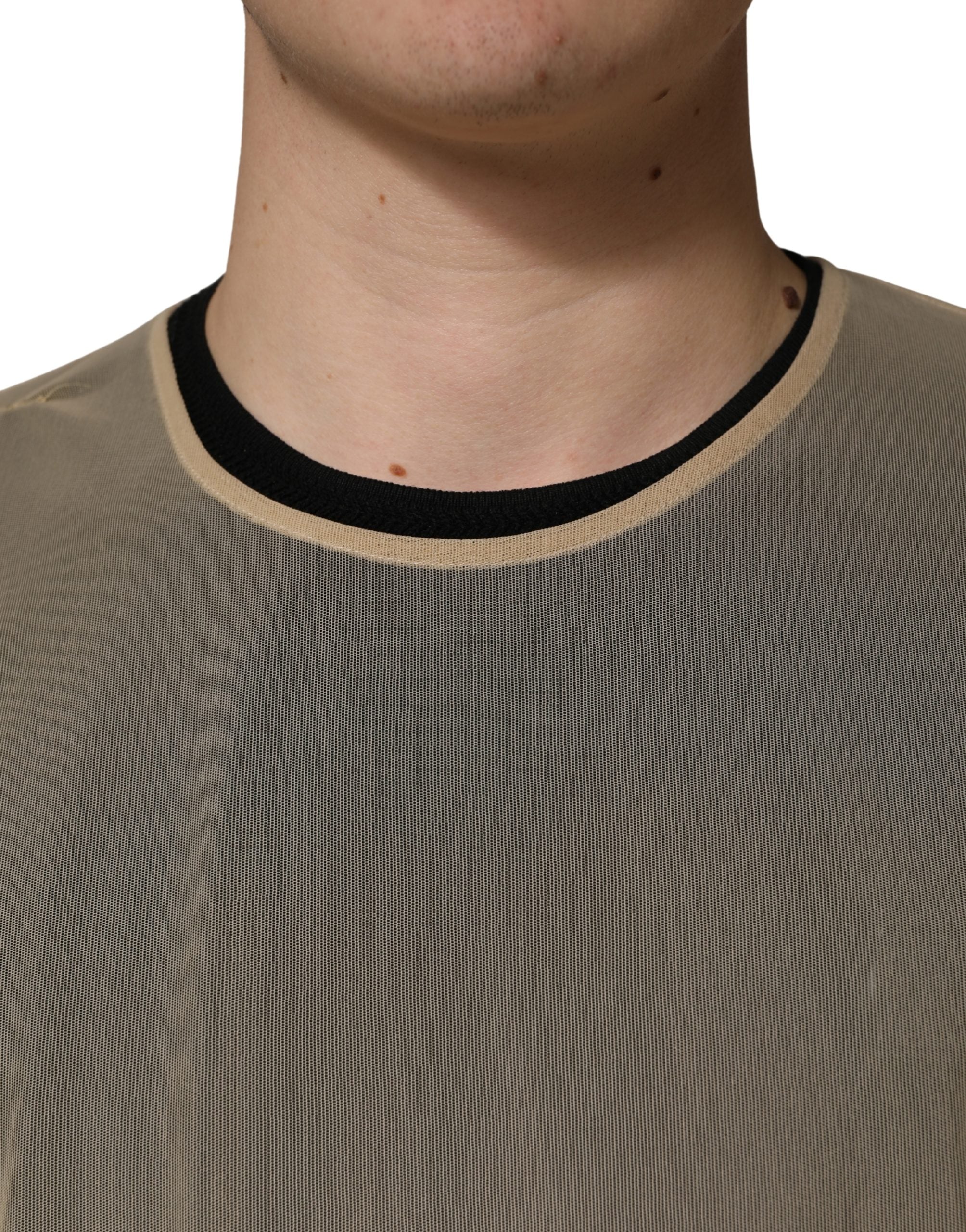 Haut sans manches beige Dolce & Gabbana, t-shirt à col rond en mesh, élégant et léger, visible en gros plan.
