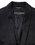 Veste blazer noire en coton Dolce & Gabbana avec un seul bouton, élégante et ajustée, vue de face.