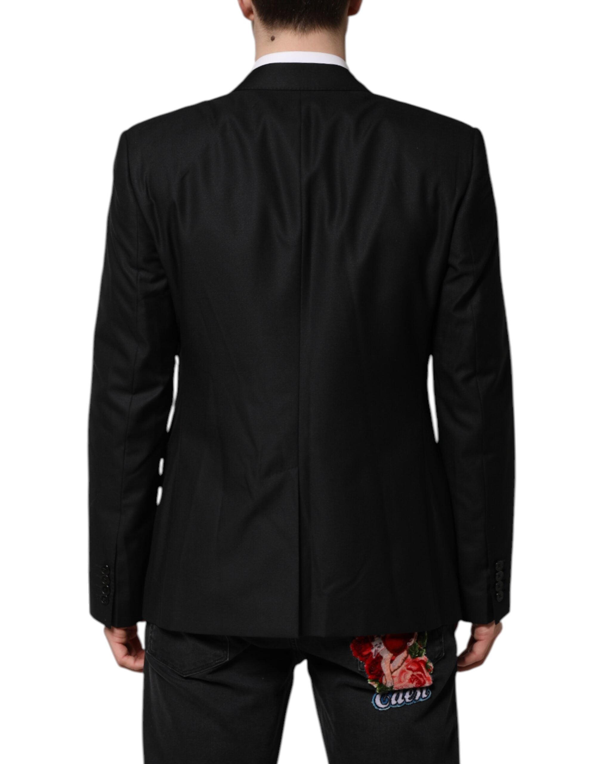 Costume deux pièces noir Dolce & Gabbana, veste à double boutonnage, élégance masculine, vue de face sur fond neutre.