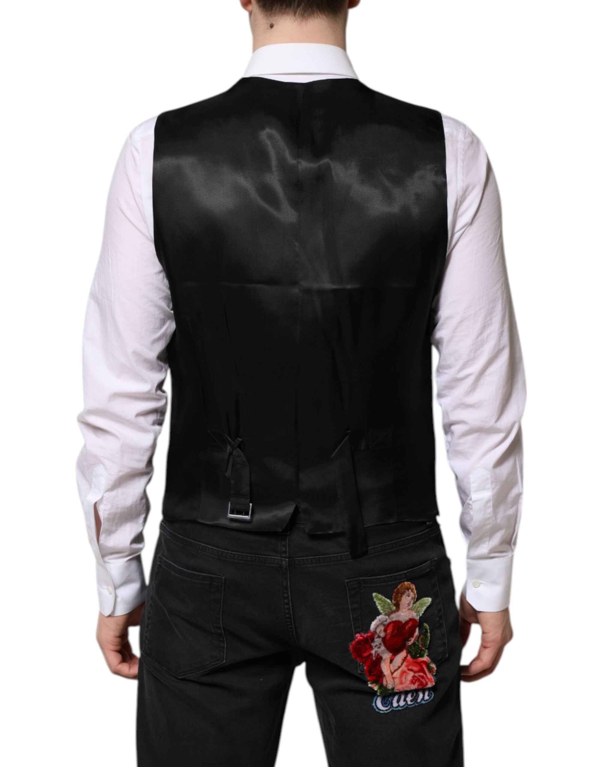 Costume noir Dolce & Gabbana à deux pièces avec veste à simple boutonnage, élégance masculine et coupe raffinée.