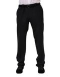 Pantalon formel en laine noire Dolce & Gabbana pour femme, coupe élégante et tissu doux.