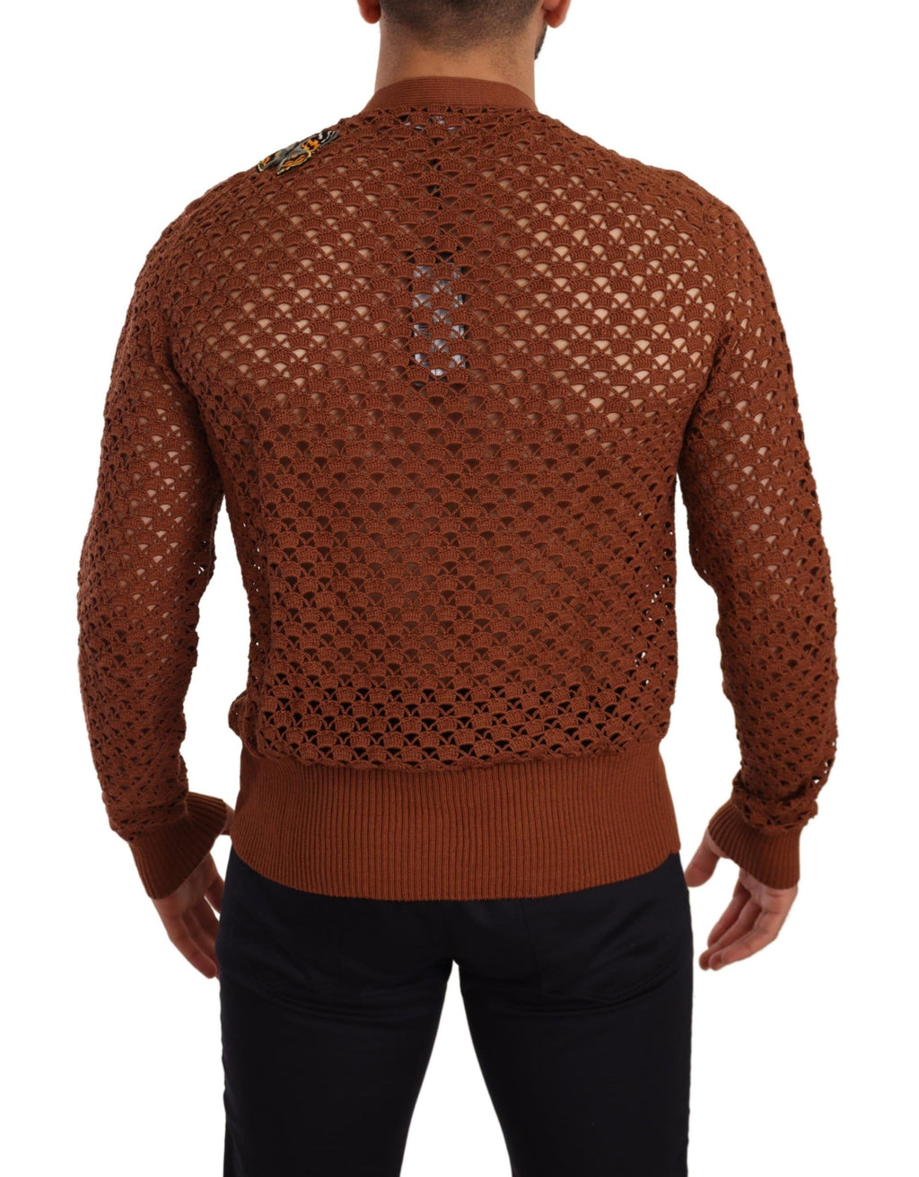 Cardigan Dolce & Gabbana en maille marron à motif léopard et papillon, détails élégants et texture douce visible sur l'image.