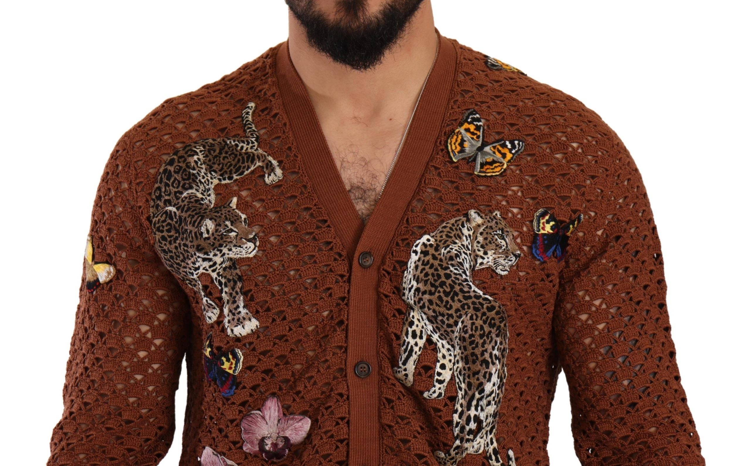 Cardigan Dolce & Gabbana en laine marron avec motif léopard et papillon, détails élégants et finis soignés.