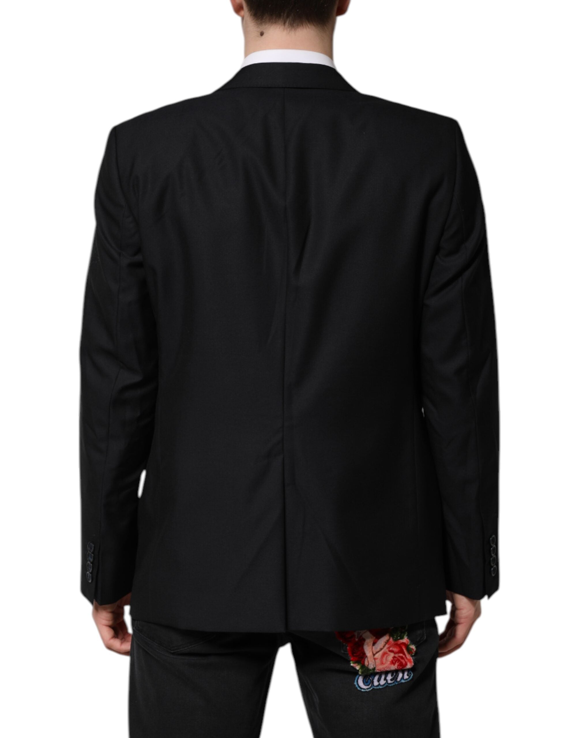 Blazer en laine bleu foncé Dolce & Gabbana Martini, veste élégante avec col et boutons, porté sur un mannequin.