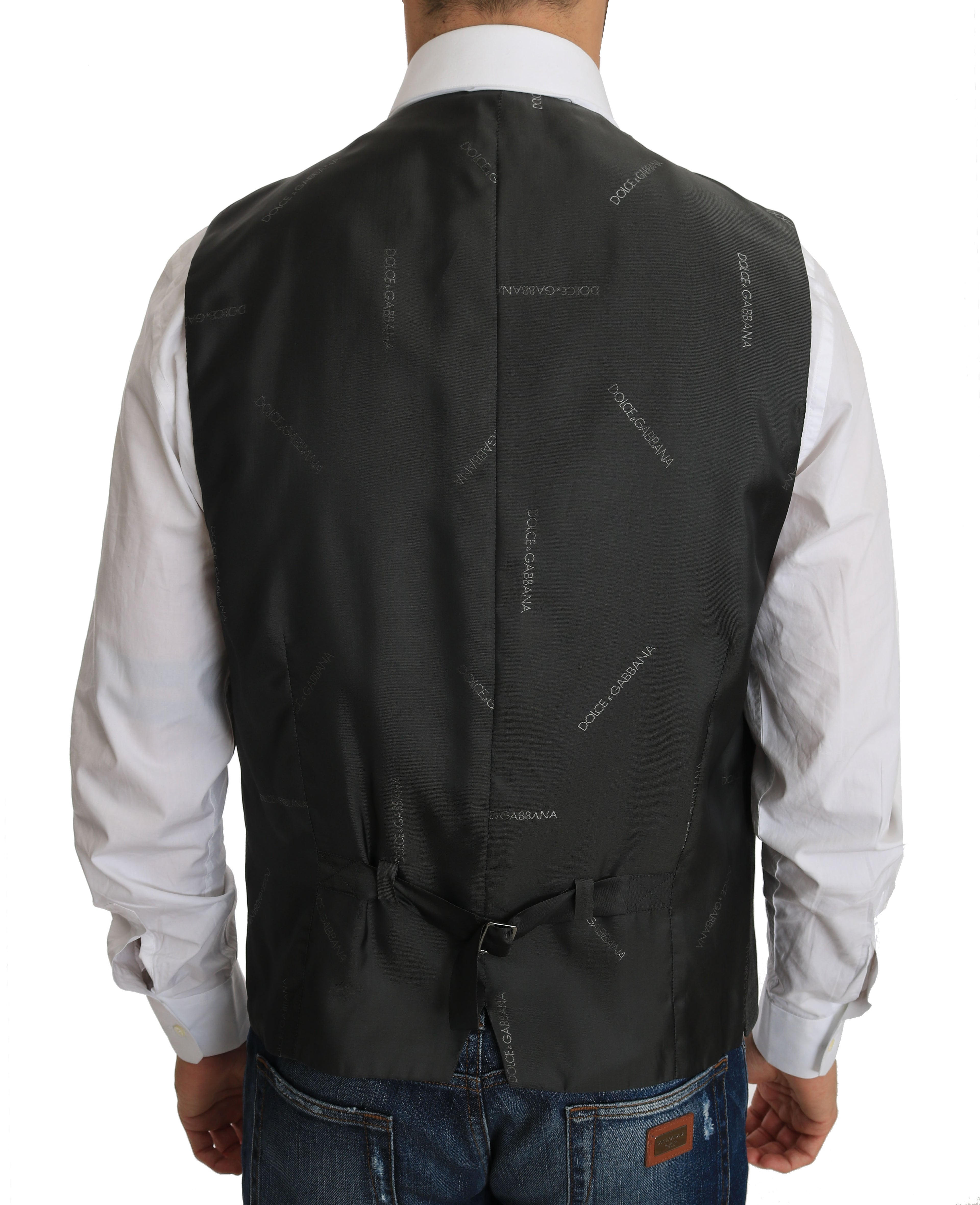 Gilet Dolce & Gabbana en laine grise à carreaux, ajusté avec stretch, style élégant et moderne.