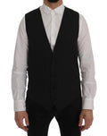 Gilet en laine grise extensible de Dolce & Gabbana, détail élégant et ajusté, porté sur un mannequin.
