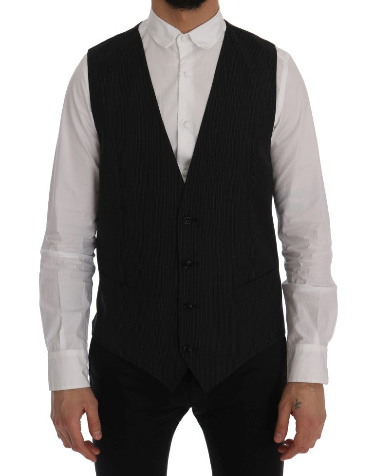 Gilet en laine grise extensible de Dolce & Gabbana, détail élégant et ajusté, porté sur un mannequin.