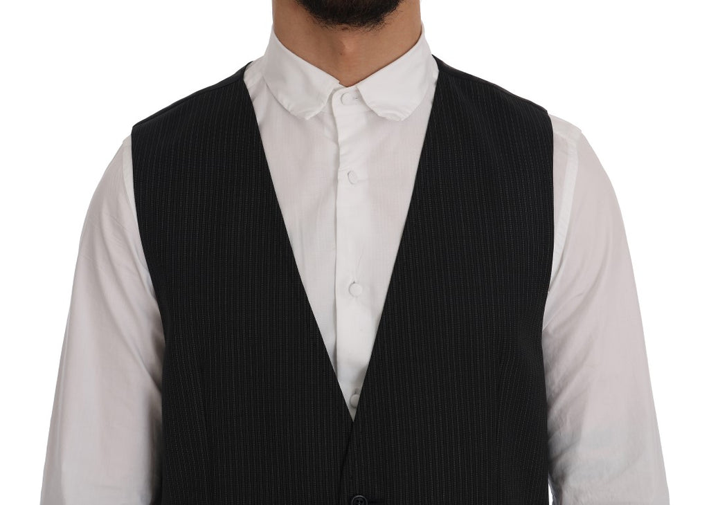 Gilet en laine gris extensible de Dolce & Gabbana, coupe ajustée et détails élégants, porté sur un mannequin.