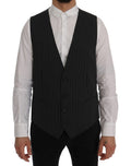 Gilet en laine grise Dolce & Gabbana, ajusté, sans manches, détail élégant pour un style sophistiqué.
