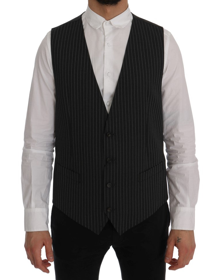 Gilet en laine grise Dolce & Gabbana, ajusté, sans manches, détail élégant pour un style sophistiqué.