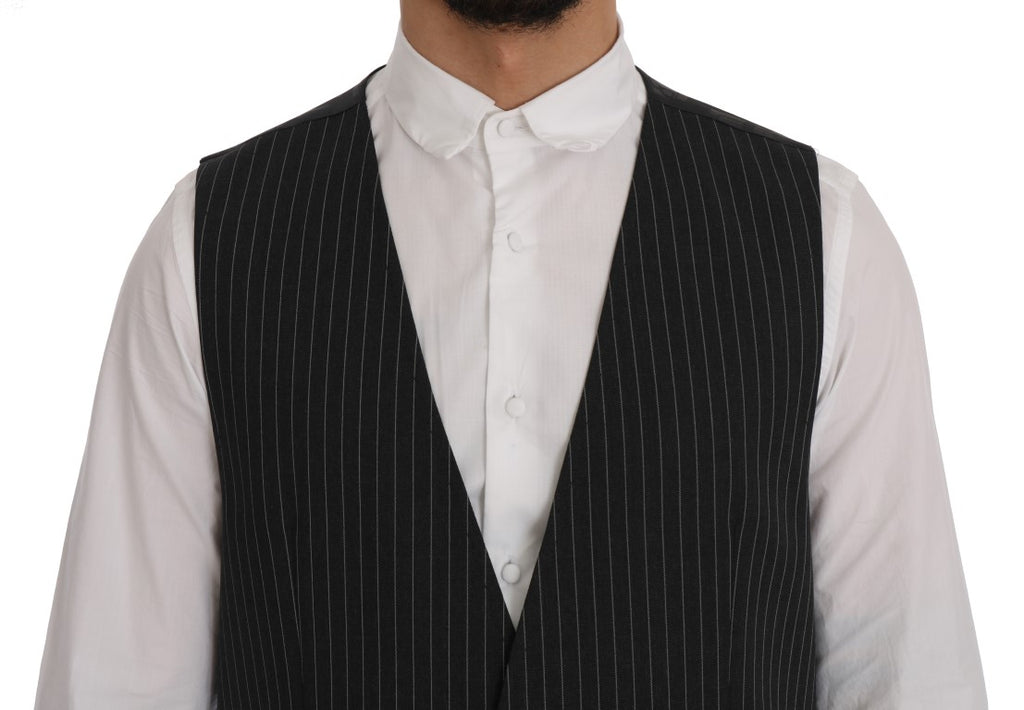 Gilet en laine gris stretch de Dolce & Gabbana, vêtement masculin élégant avec col en V et finition soignée.