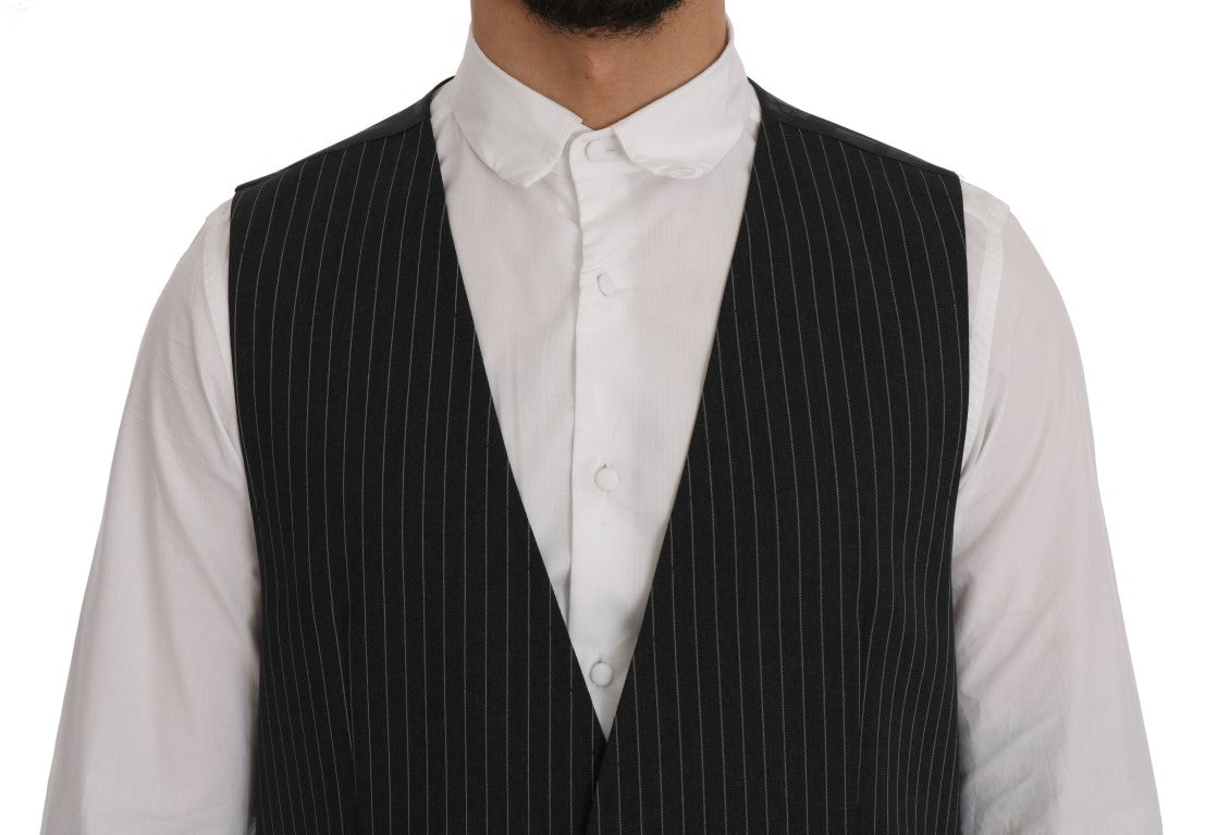 Gilet en laine gris stretch de Dolce & Gabbana, vêtement masculin élégant avec col en V et finition soignée.