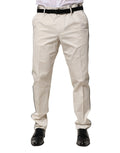Pantalon habillé blanc en coton de la marque Dolce & Gabbana, style élégant et ajusté pour occasions formelles.