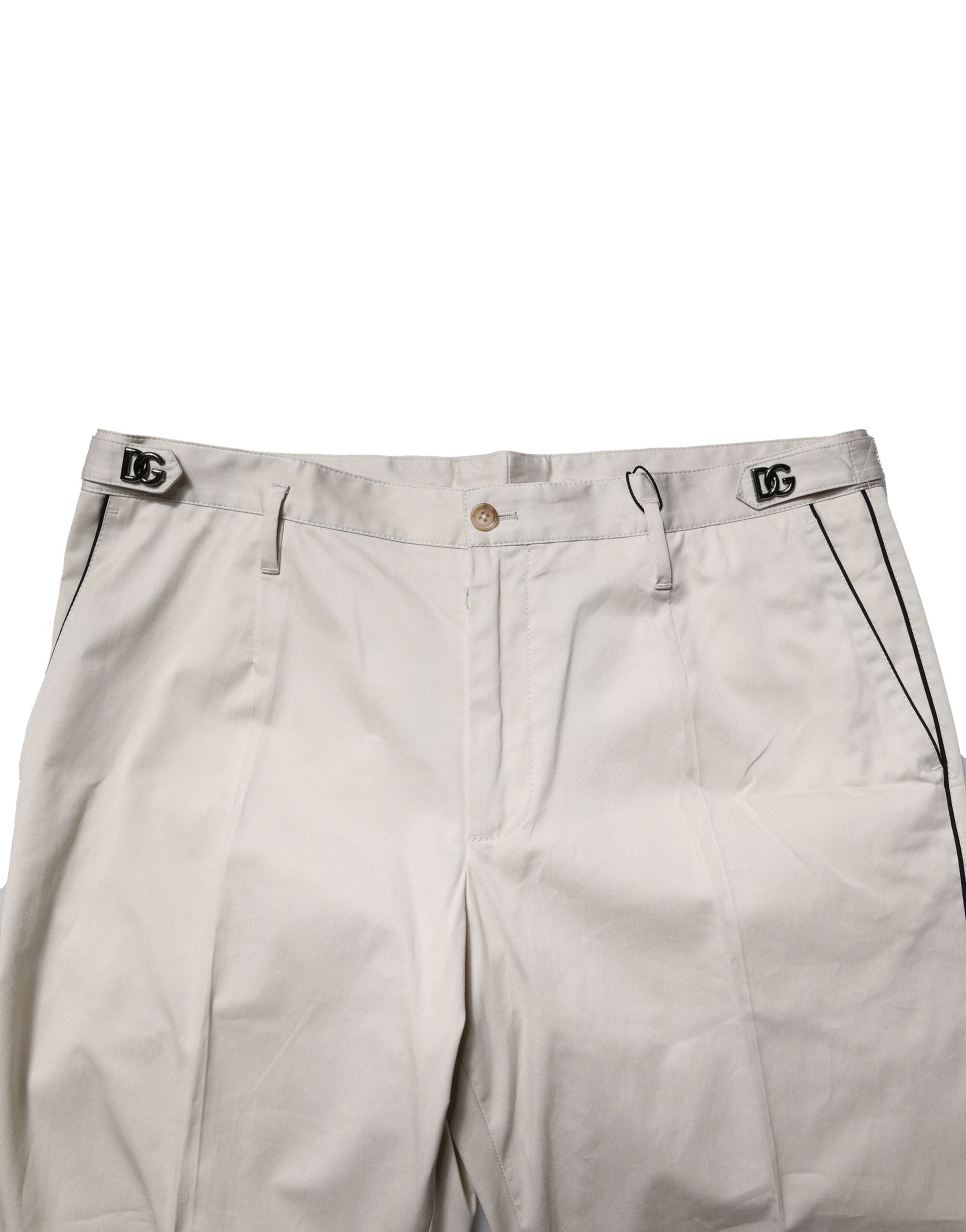 Pantalon slim en coton blanc de la marque Dolce & Gabbana, style formel et élégant pour femme.