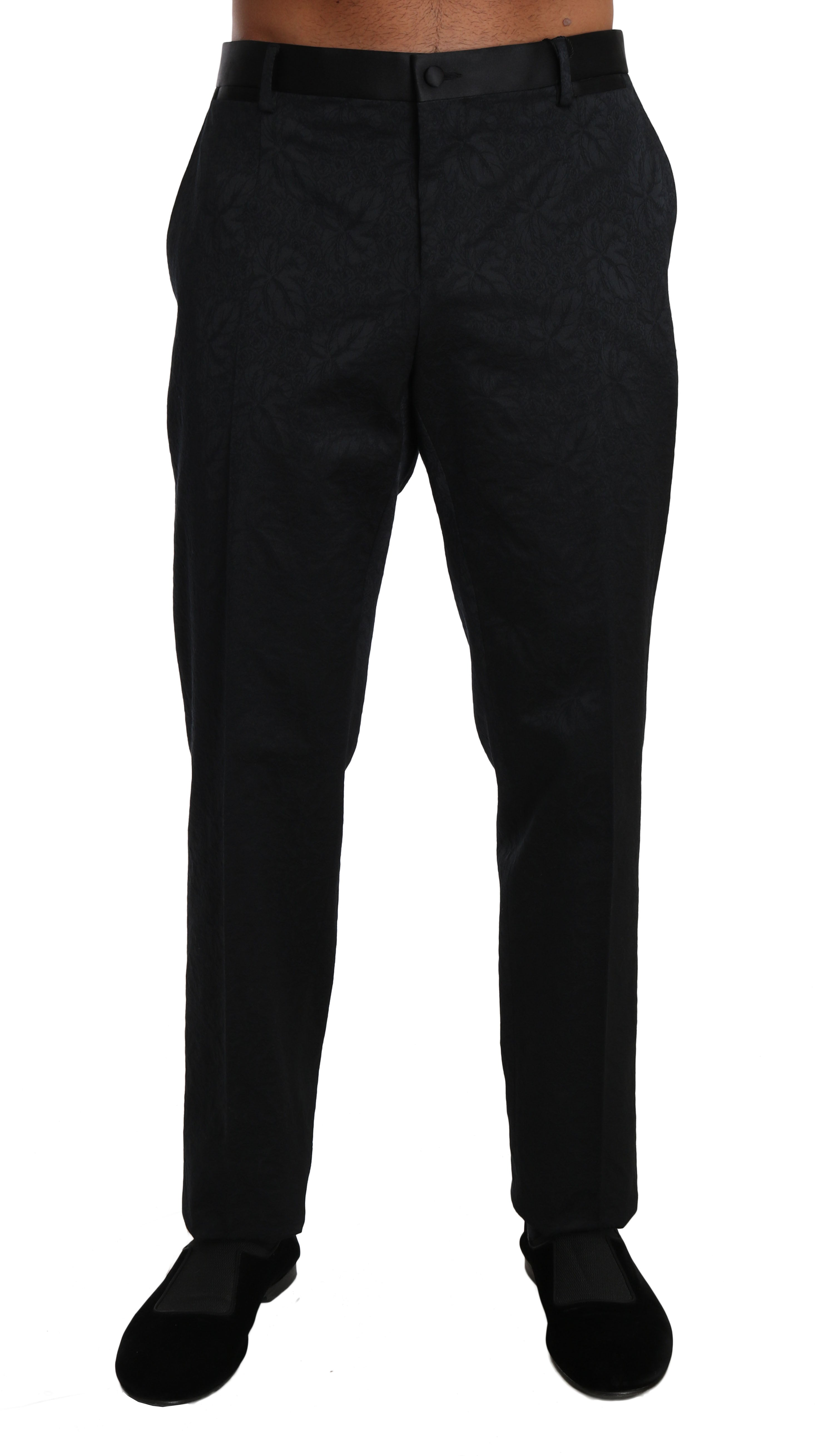 Pantalon formel en coton noir à brocart de Dolce & Gabbana, style élégant et sophistiqué, visible en détail sur l'image.