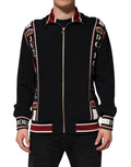 Sweat-shirt noir Dolce & Gabbana DG King à fermeture éclair complète, en tissu doux et élégant, porté sur un mannequin.