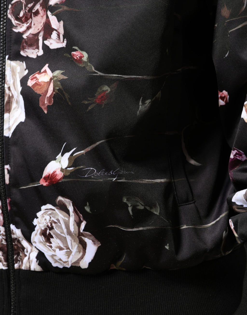 Veste bomber noire en polyester avec motifs floraux Dolce & Gabbana, zip complet et style élégant.