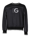 Pull ras du cou noir Dolce & Gabbana en polyester avec logo visible, porté par un homme.