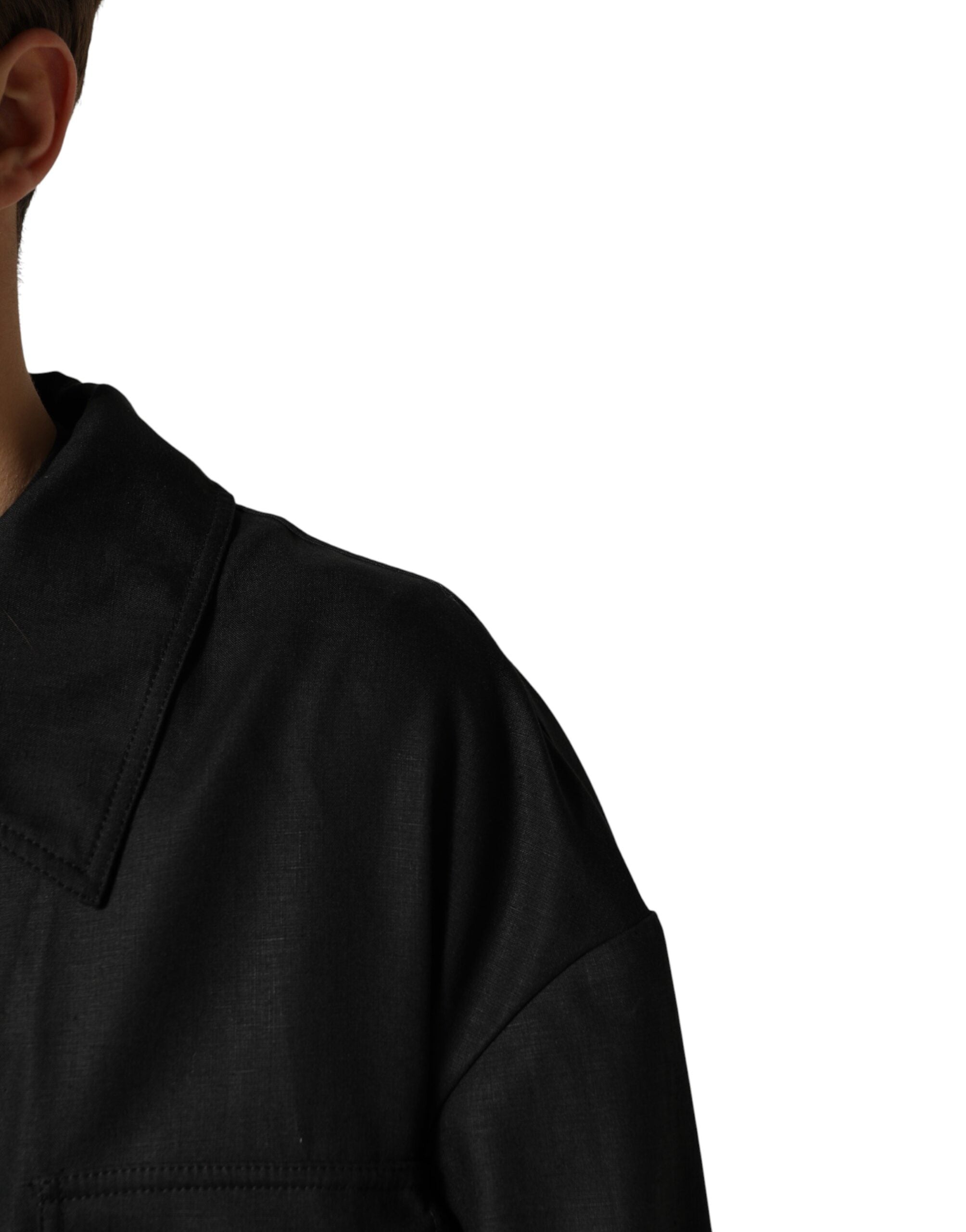 Manteau trench noir Dolce & Gabbana avec poches, col montant et coupe élégante, porté sur un mannequin.