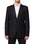 Veste blazer noire en laine pour homme Dolce & Gabbana avec deux boutons, élégante et classique.