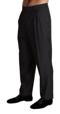 Pantalon formel en laine mélangée gris de Dolce & Gabbana, coupe élégante et tissu de qualité visible sur l’image.